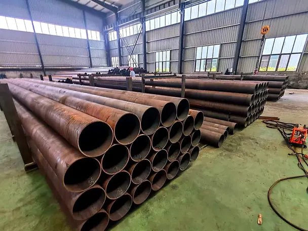 Steel pipes stacked in our warehouse ready for packing